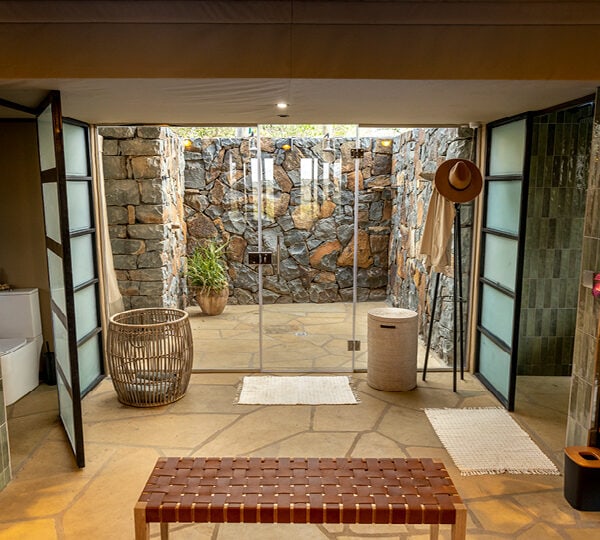 En suite bathroom with both indoor and outdoor shower