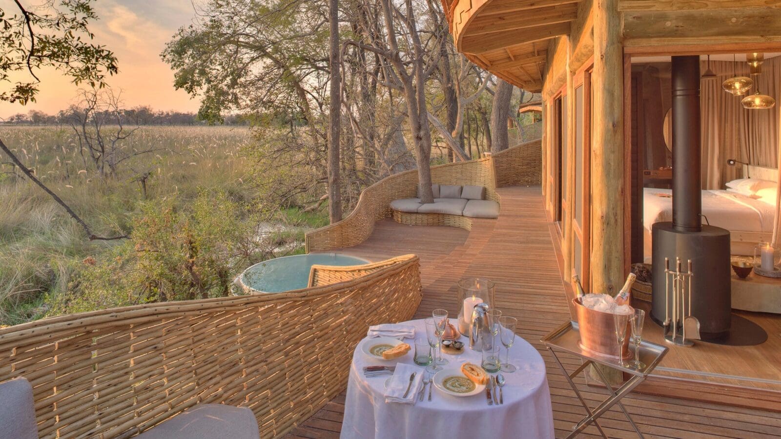 Private dinning table overlooking the bush at Sandibe Okavango Safari Lodge